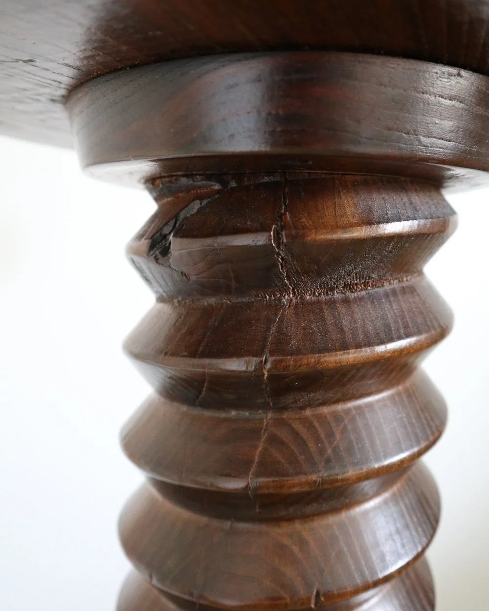 A large, turned wooden screw pedestal plinth to display plants or art. Circa 1970s.
