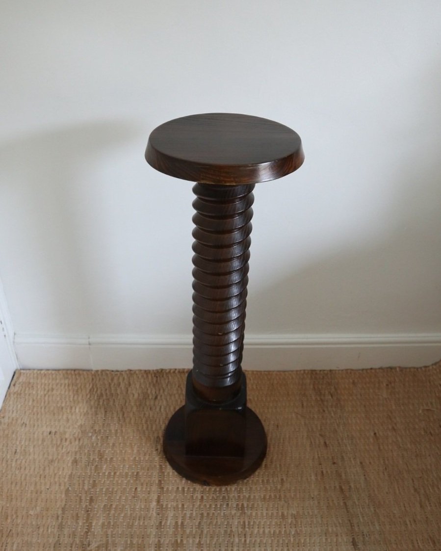 A large, turned wooden screw pedestal plinth to display plants or art. Circa 1970s.