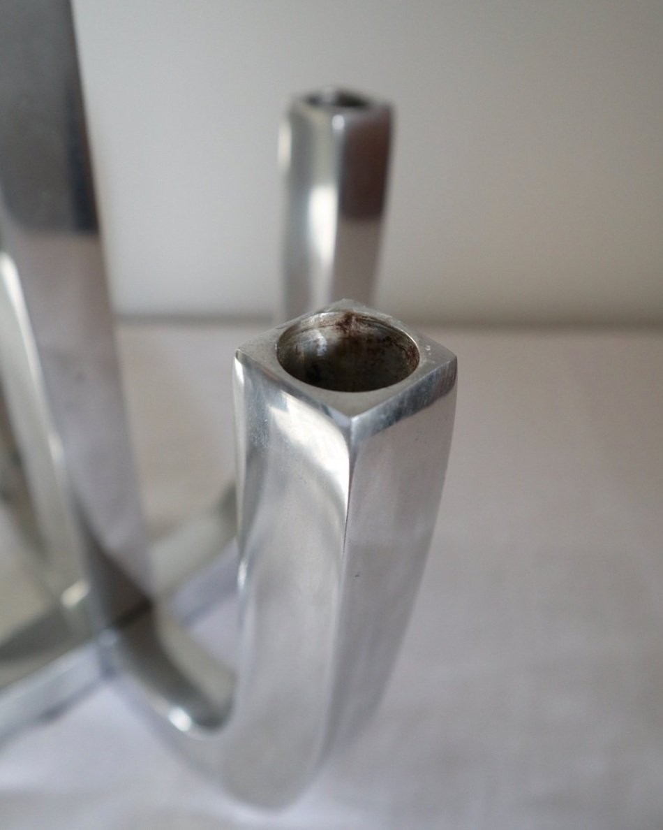 Pair of five arm heavy chrome candelabras.