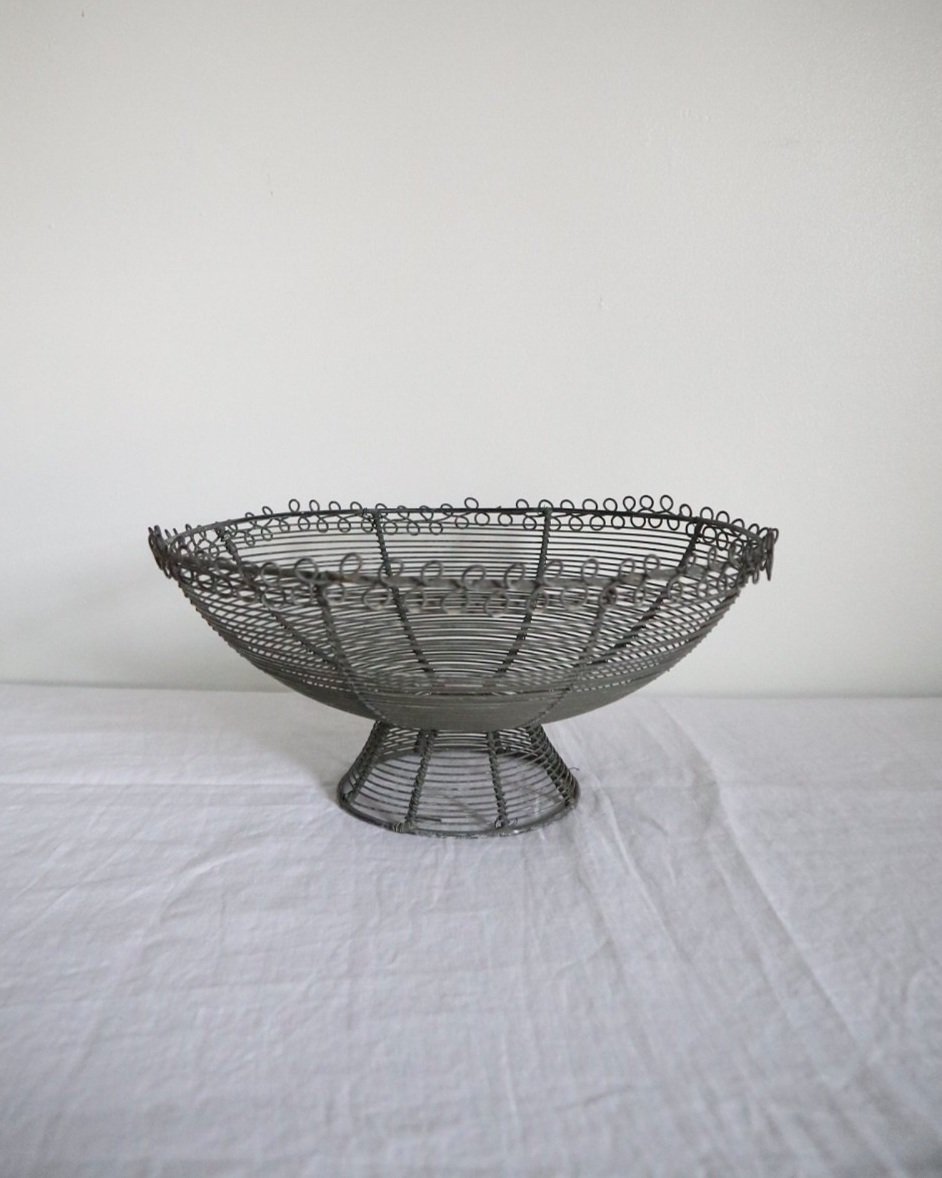 Decorative vintage French style woven wire metal centrepiece bowl/basket on pedestal base and twisted detailing to edges.
