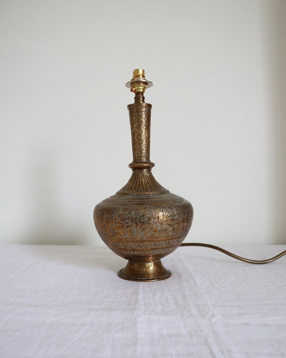 Vintage Indian brass surahi, water flask table lamp with decorative and intricate etchings
