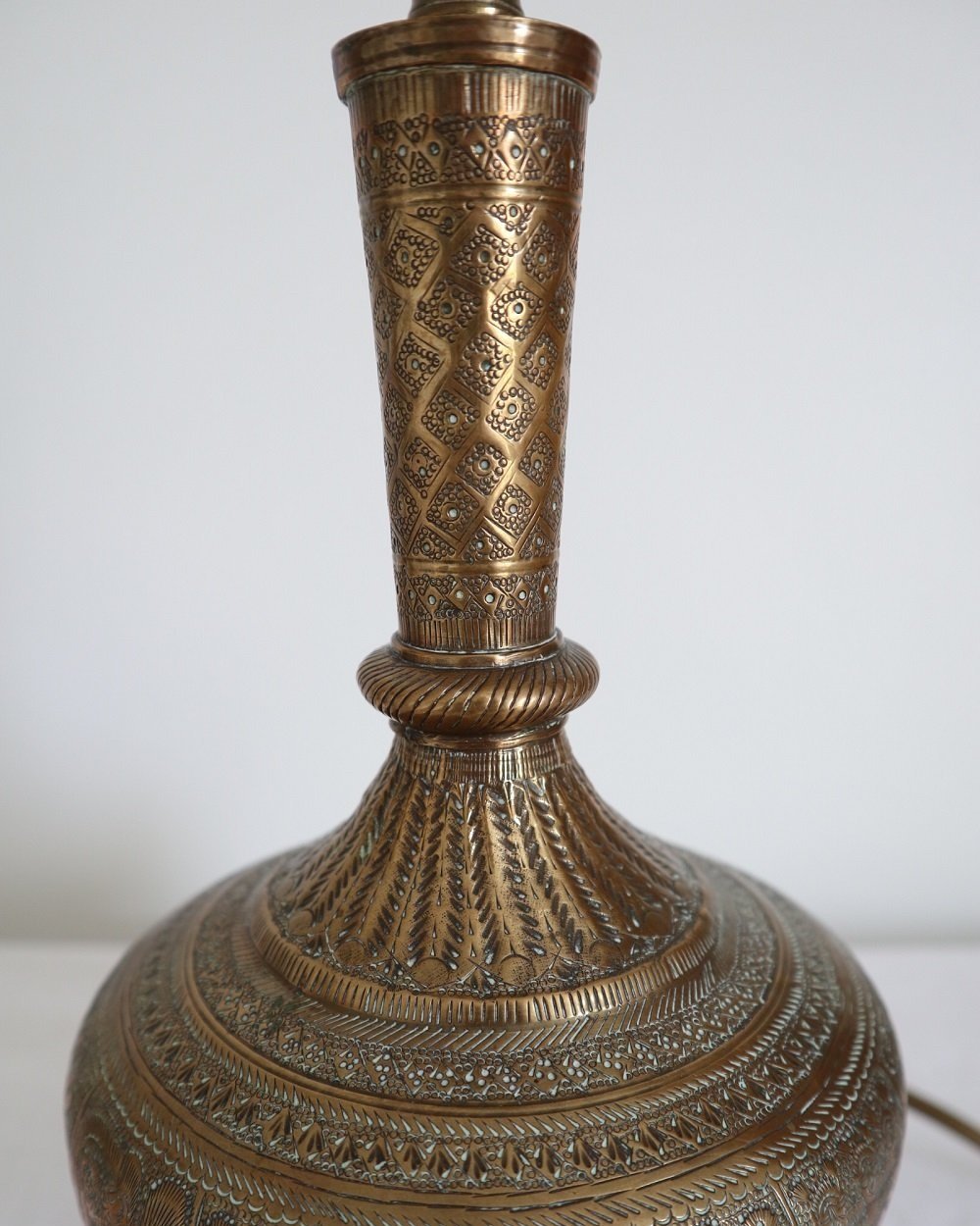 Vintage Indian brass surahi, water flask table lamp with decorative and intricate etchings