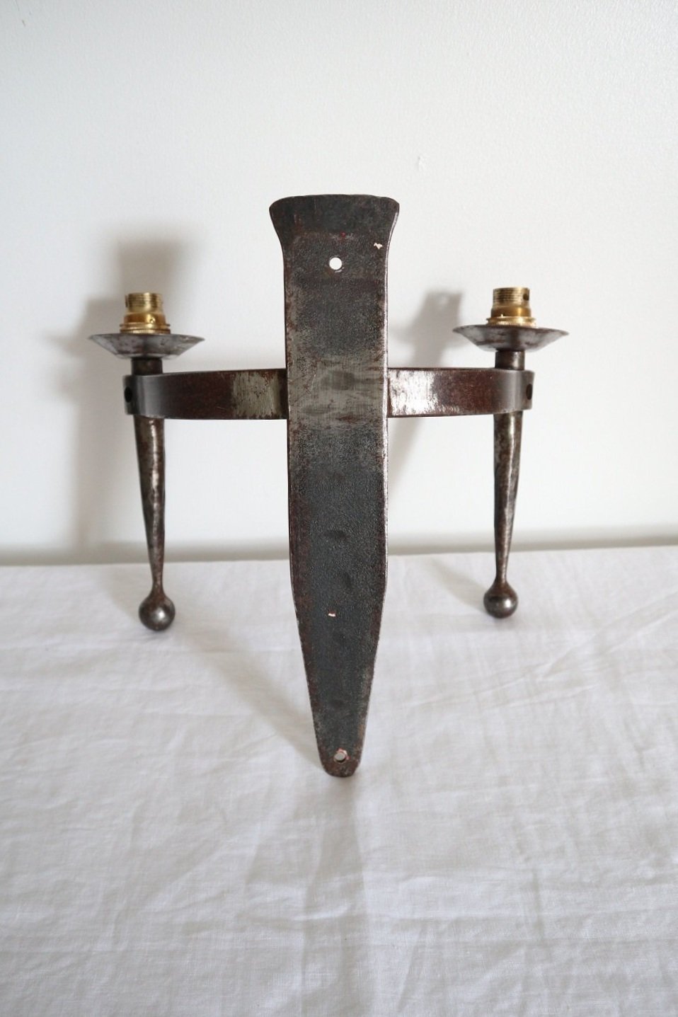 Pair of French gothic, medieval style heavy forged iron wall sconces