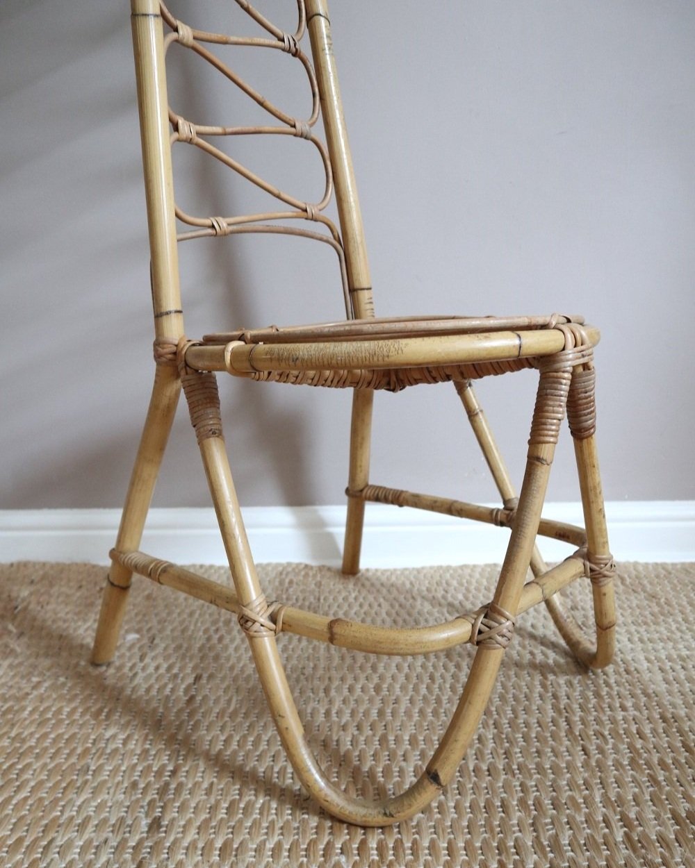 Mid century high backed bamboo and cane chair, circa 1960s.
