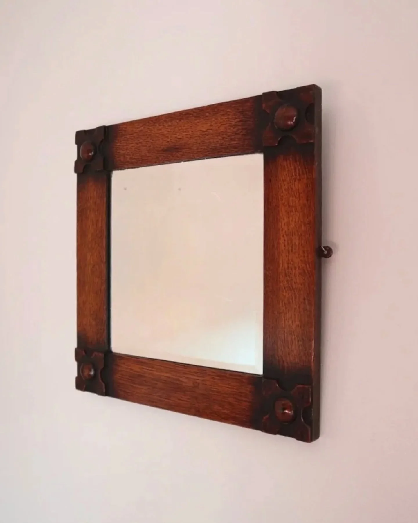 New to Peach ~ Arts &amp; Crafts square wooden framed mirror with carved corner detailing. Circa 1930s. 

In good vintage condition, some light wear. Slight foxing to the glass, only visible in certain lights and very difficult to photograph!

Hangin