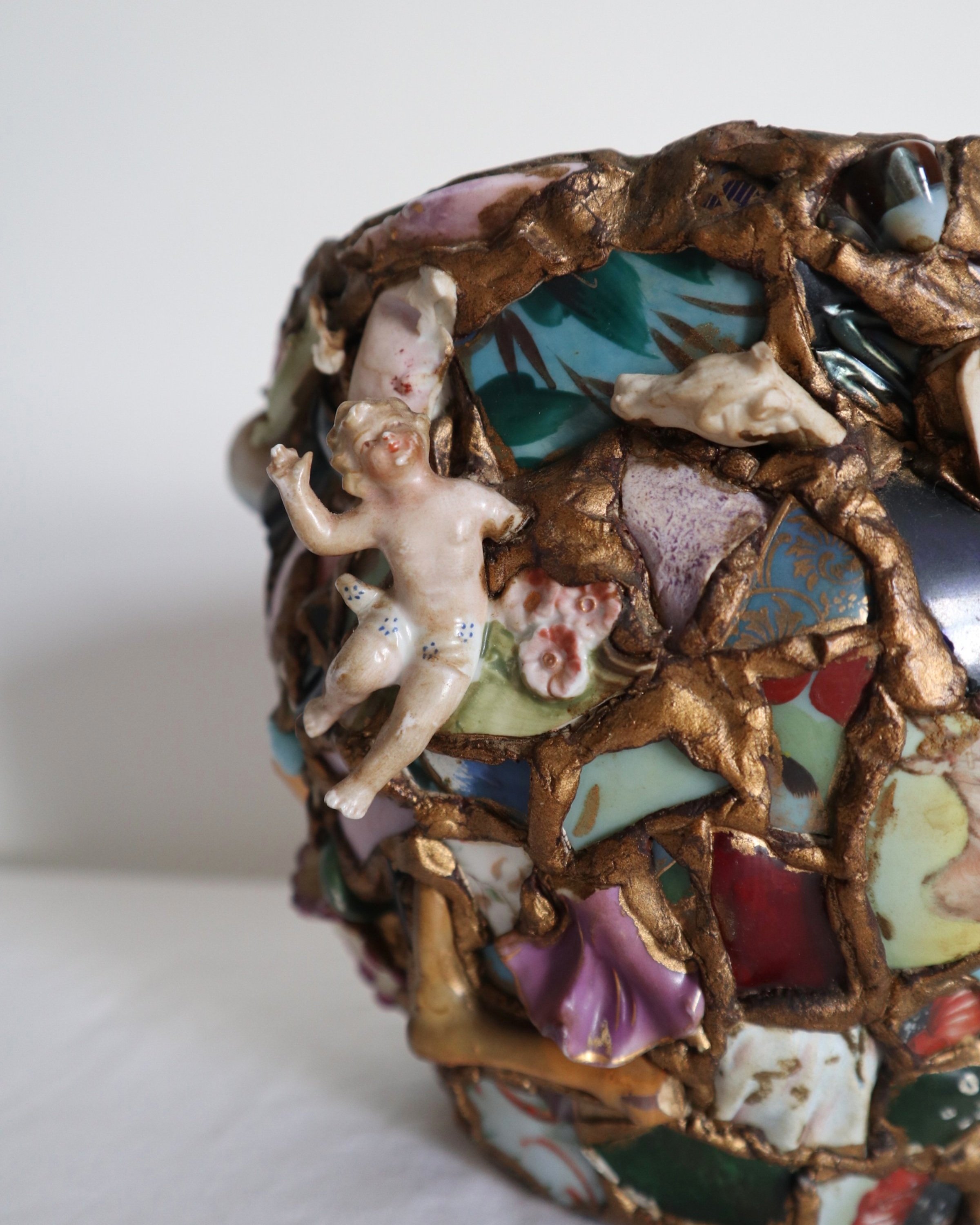 Quirky and characterful pique assiette mosaic pottery plant pot.