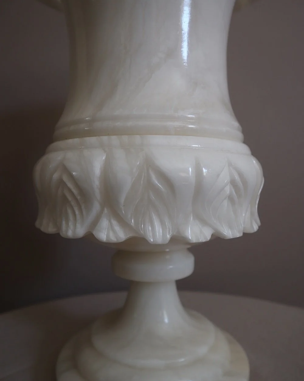 Large Italian carved alabaster urn table lamp, with delicate petal details.