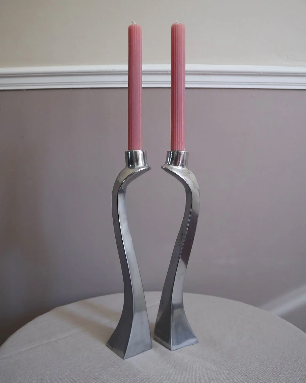 Pair of tall, elegant 1980s Modernist cast aluminium candleholders, likely 'Nessie' style designed by Matthew Hilton.