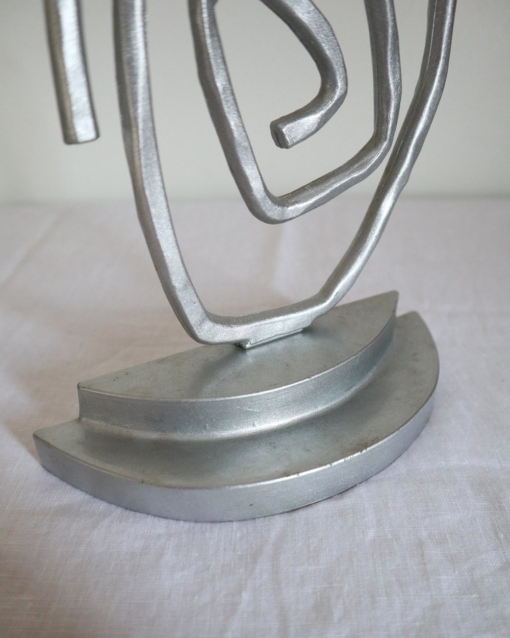 Pair of Postmodern sprayed silver spiral bookends, circa 1990s.