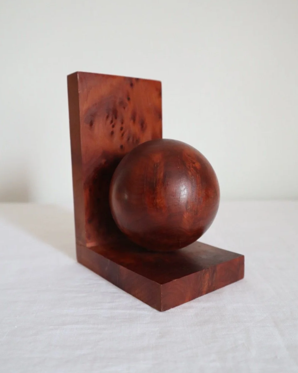 Vintage pair of burr wood Art Deco style orb book ends.