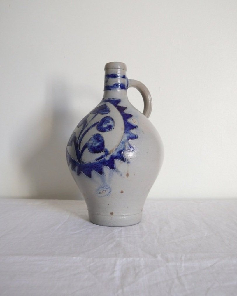Large vintage German Westerwald salt glazed stoneware flagon with cobalt blue foliage decoration and two bands to the neck.