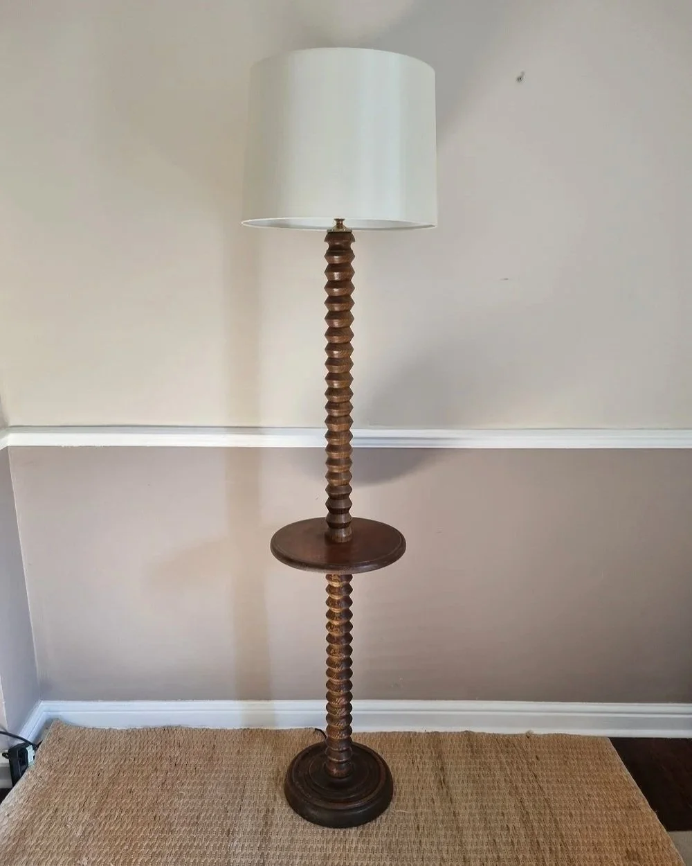 French, tall carved wooden Brutalist floor lamp with shelf platform in the manner of Charles Dudouyt, circa 1940s.