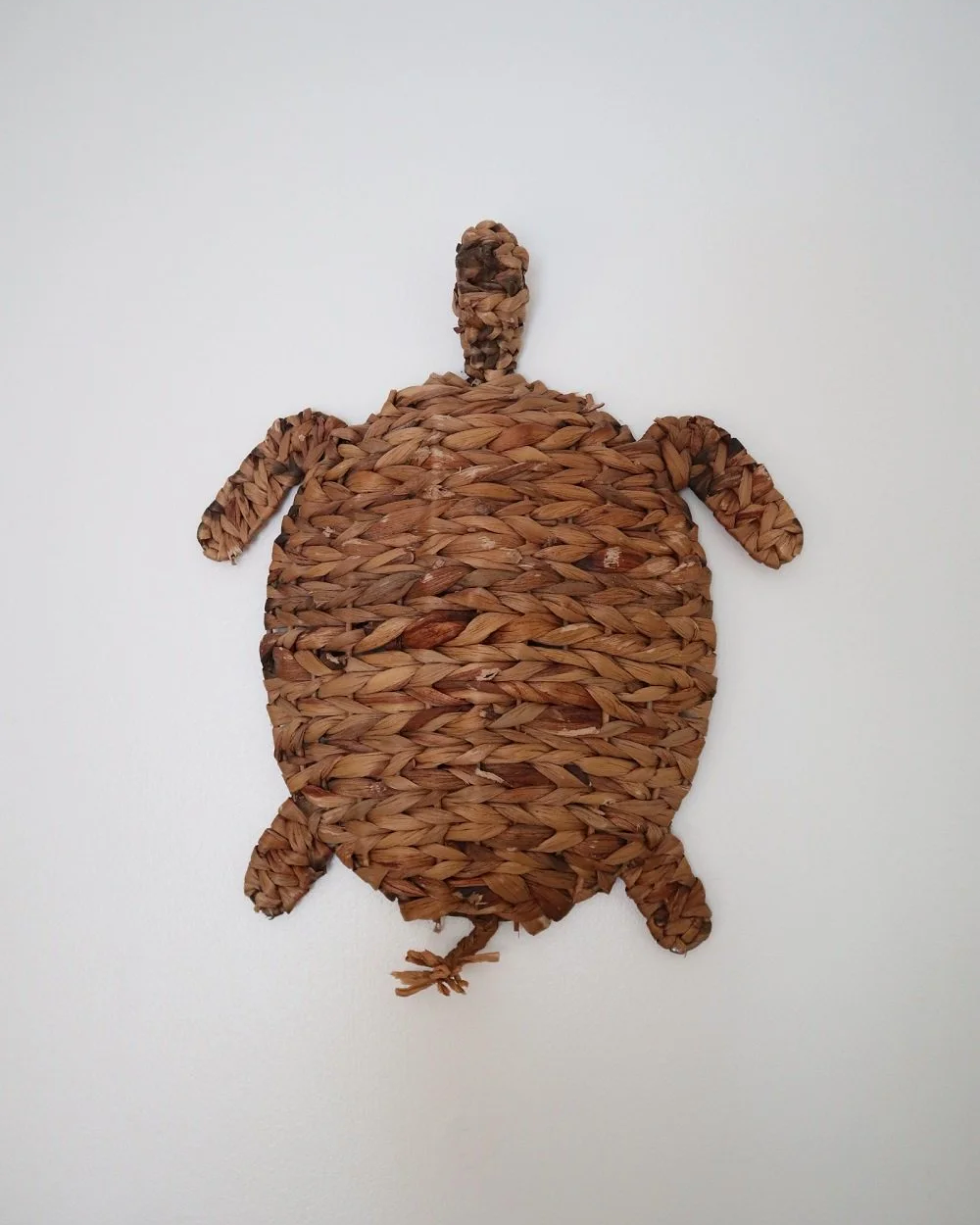 Set of two vintage turtle wall hangings handmade with woven natural water hyacinth.