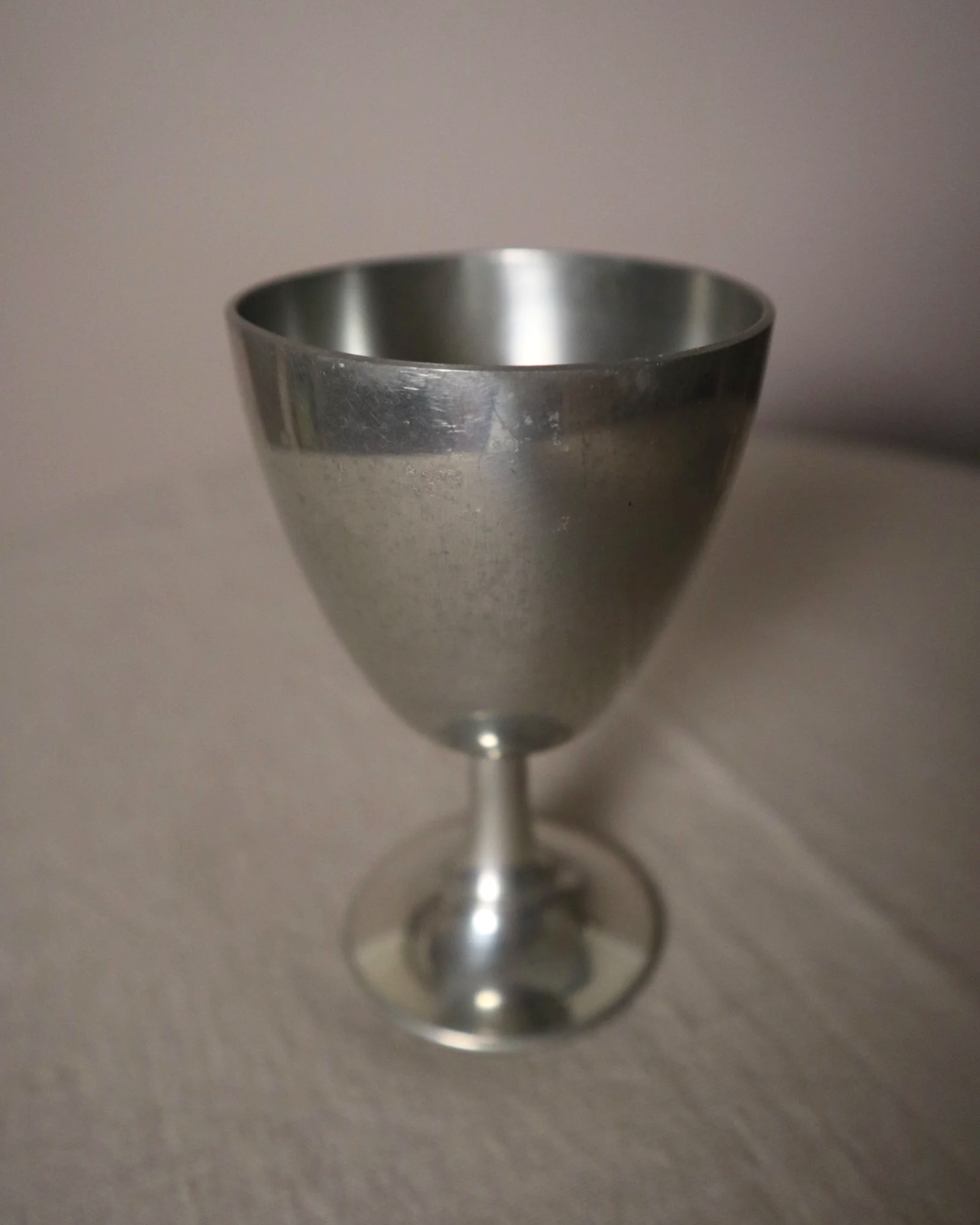 Pair of British P.H. Vogel & Co pewter goblets. Made in England. Circa 1970s.
