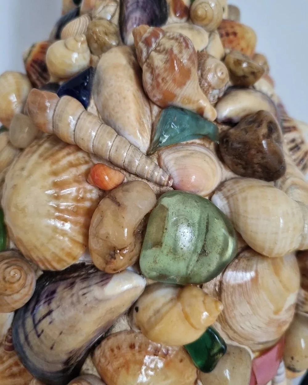 Vintage, tall folk art decorative table lamp adorned with sea shells and coloured glass.