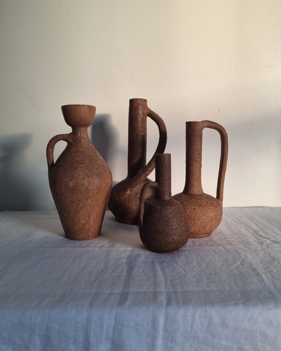 Pair of sculptural textured ceramic vessels