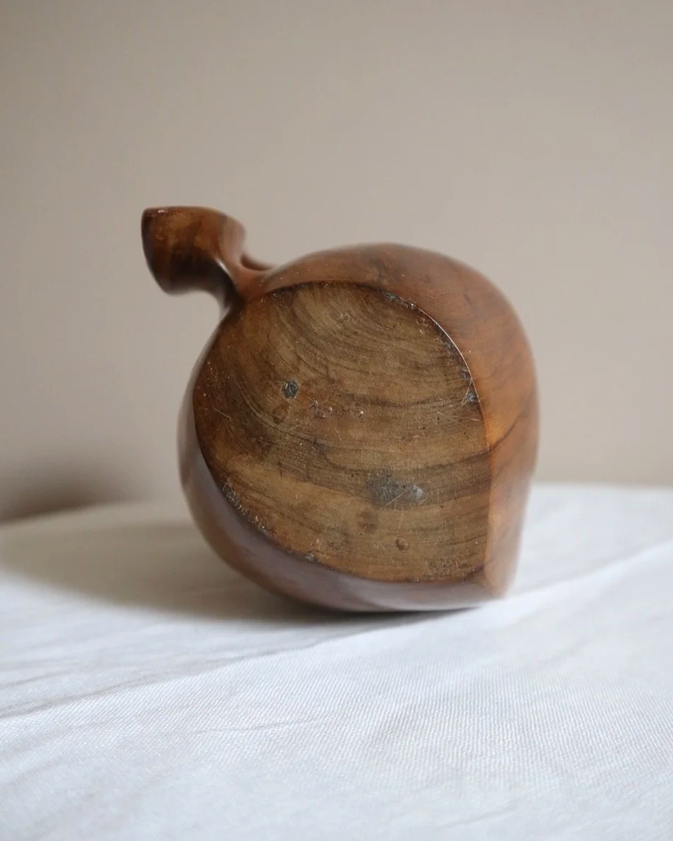 Small mid century hand carved sculptural olivewood jug in the style of Alexandre Noll. Circa 1960s.