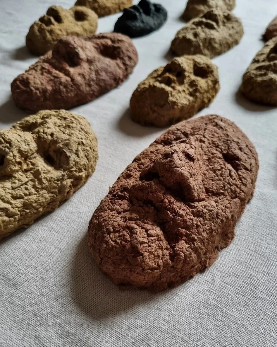 Set of unique handmade textured papier mache faces in earthy tones. Unknown age.  Unknown artist.