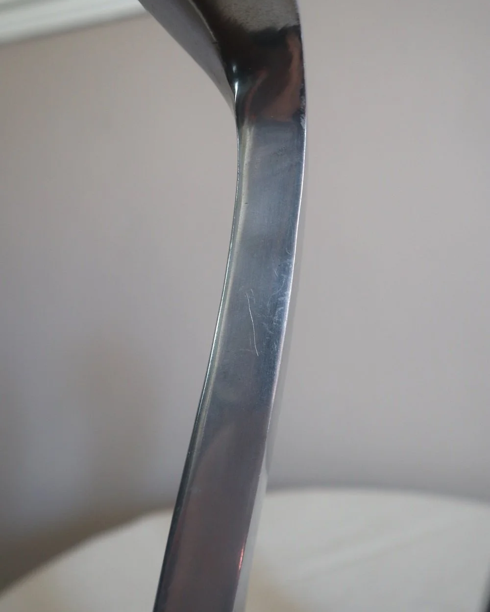 Pair of tall, elegant 1980s Modernist cast aluminium candleholders, likely 'Nessie' style designed by Matthew Hilton.