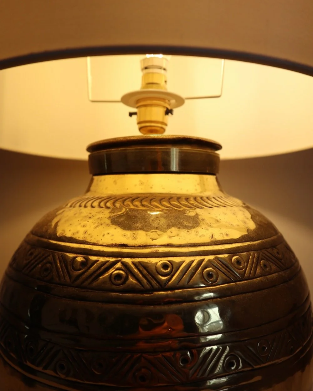 Pair of large, vintage beaten brass spherical table lamps with etched decoration.
