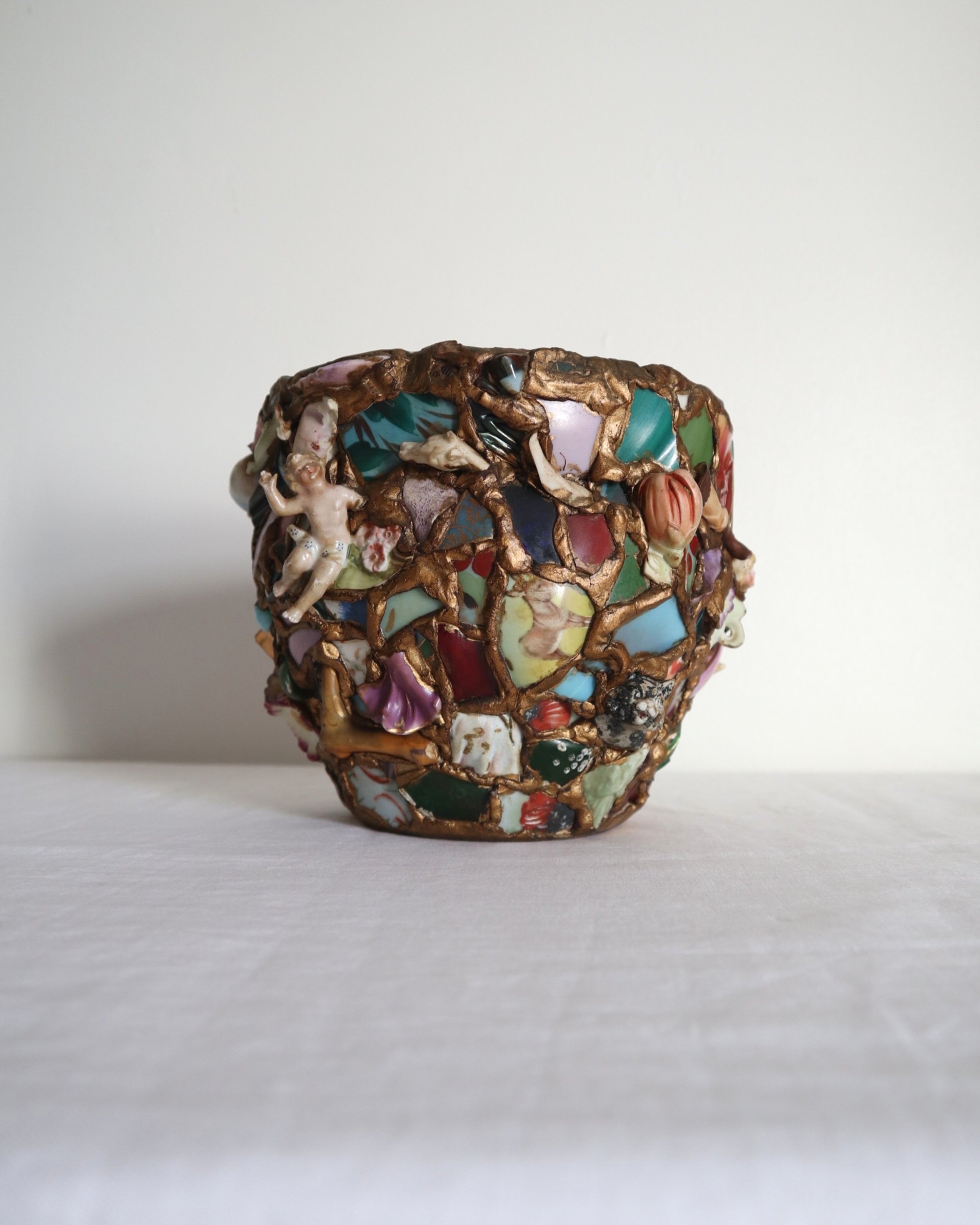 Quirky and characterful pique assiette mosaic pottery plant pot.