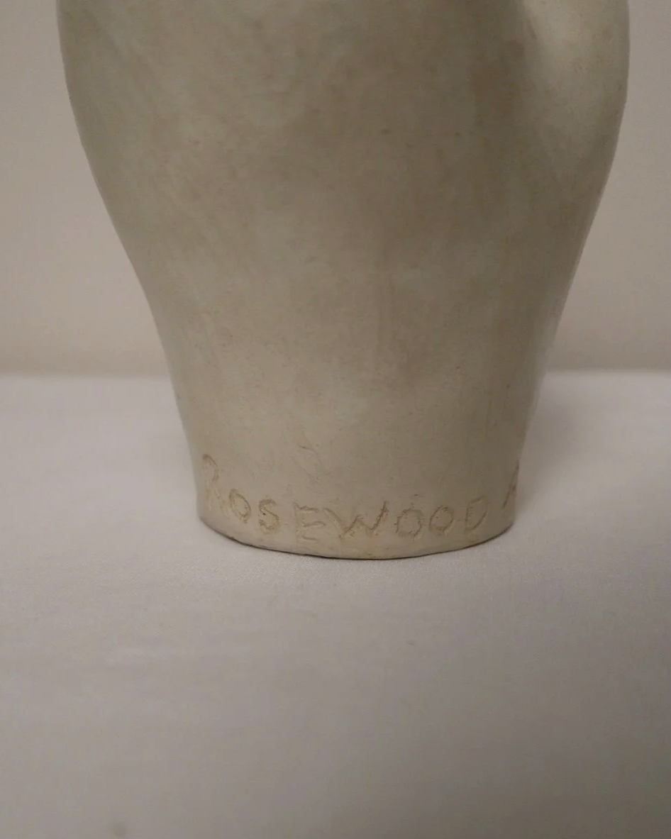 Set of three white ceramic abstract sculptures in the shape of the female form. Unknown age.  Signed 'R W Art / RoseWood Art'