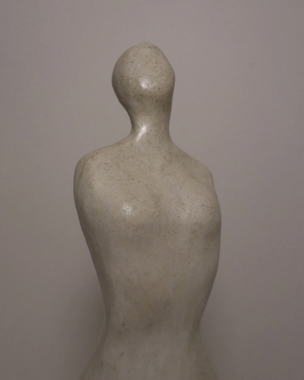 Set of three white ceramic abstract sculptures in the shape of the female form. Unknown age.  Signed 'R W Art / RoseWood Art'