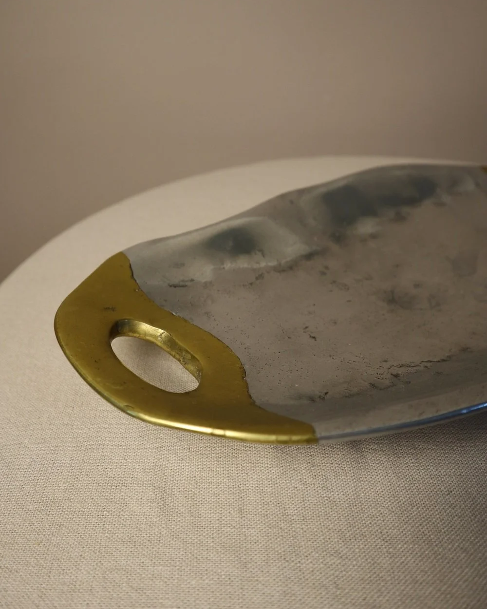 Brutalist heavy cast aluminium and brass decorative shallow bowl /dish by David Marshall, circa 1970s.