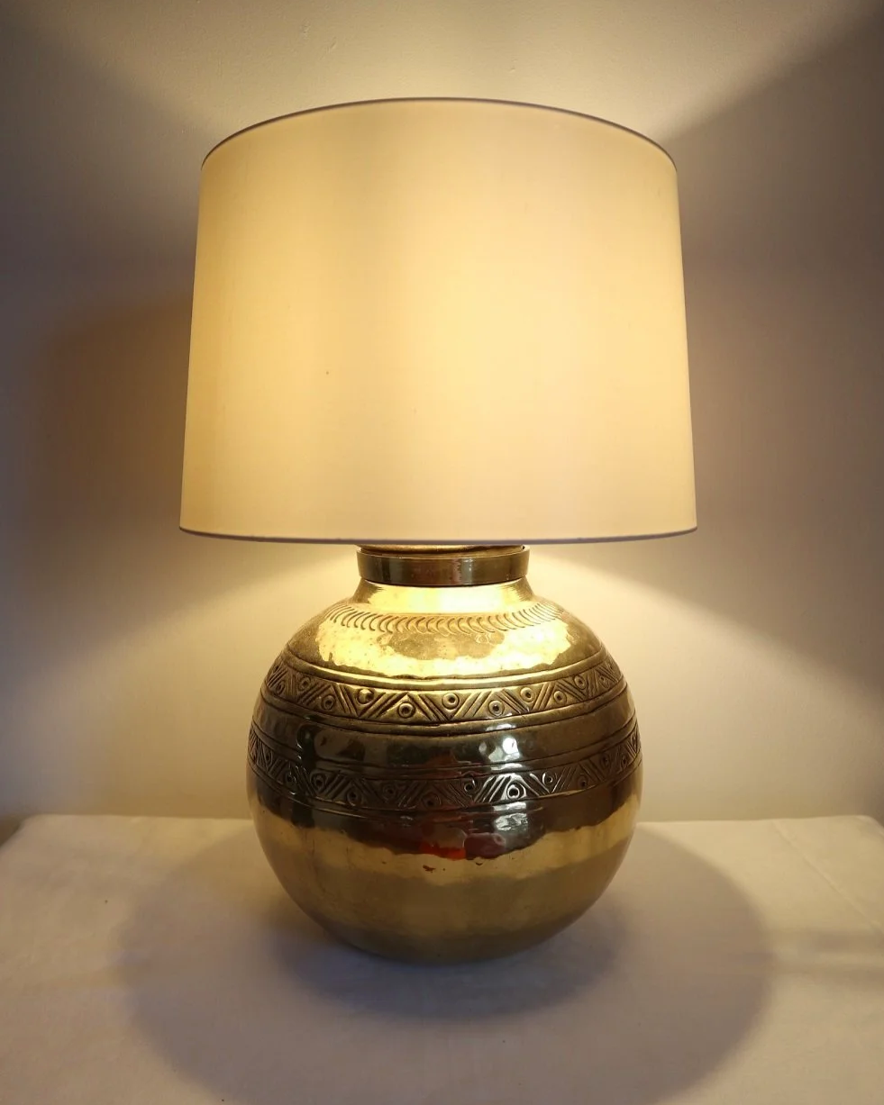 Pair of large, vintage beaten brass spherical table lamps with etched decoration.
