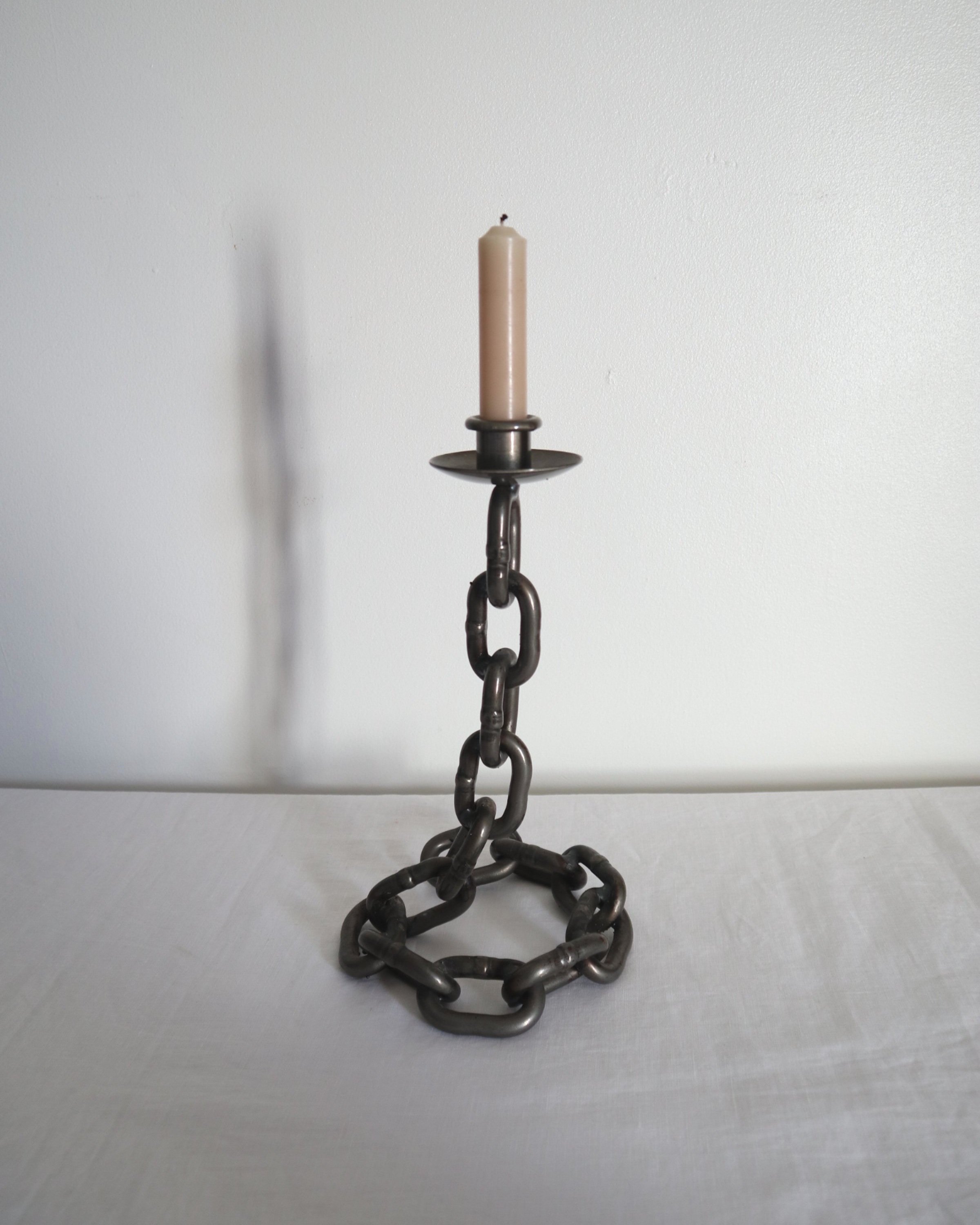 Heavy, vintage Brutalist chain link candlestick made from lacquered grey forged iron.