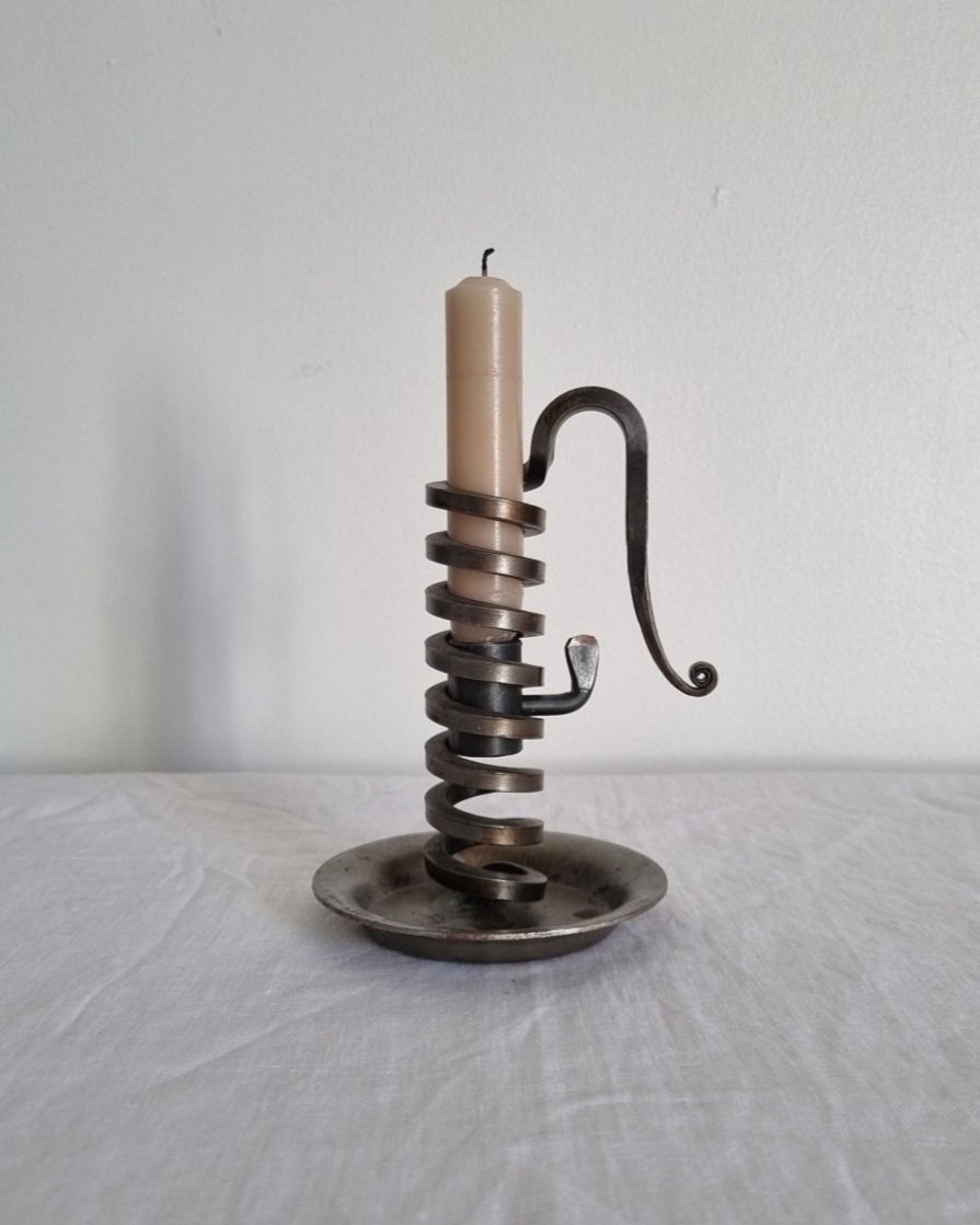 Vintage French 'Rat de cave' iron candleholder with turning spiral mechanism and signature curled handle. Circa 1970s. Marked 'Bourgogne Bouillot 71220 France'.