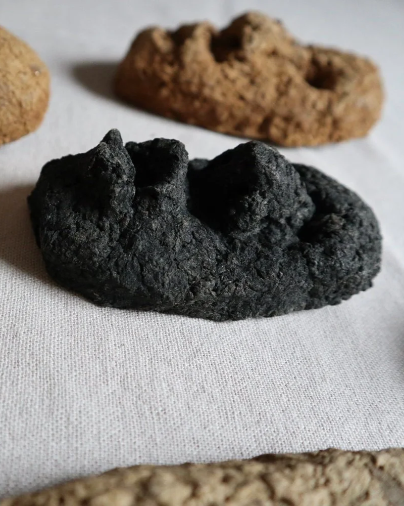 Set of unique handmade textured papier mache faces in earthy tones. Unknown age.  Unknown artist.