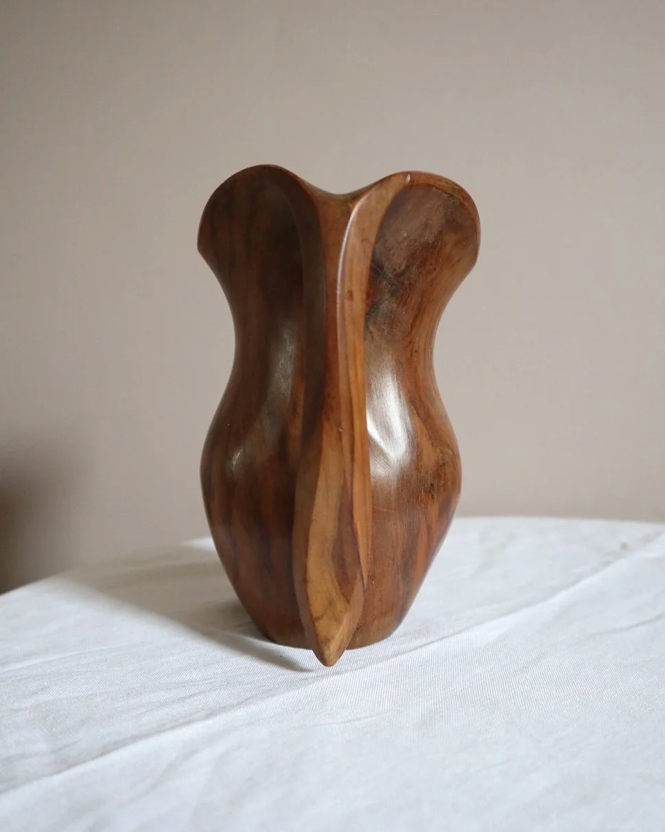 Small mid century hand carved sculptural olivewood jug in the style of Alexandre Noll. Circa 1960s.