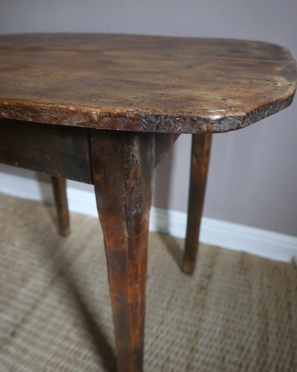 Vintage French, rustic tall wooden hallway table with organic, curved edge top.