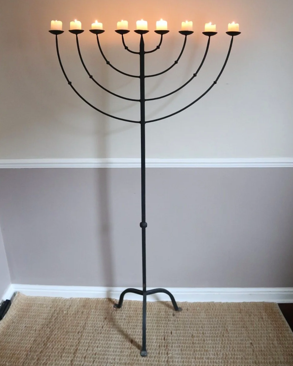 Large Brutalist wrought iron 9 arm Hanukkah candleholder. Circa 1970s.