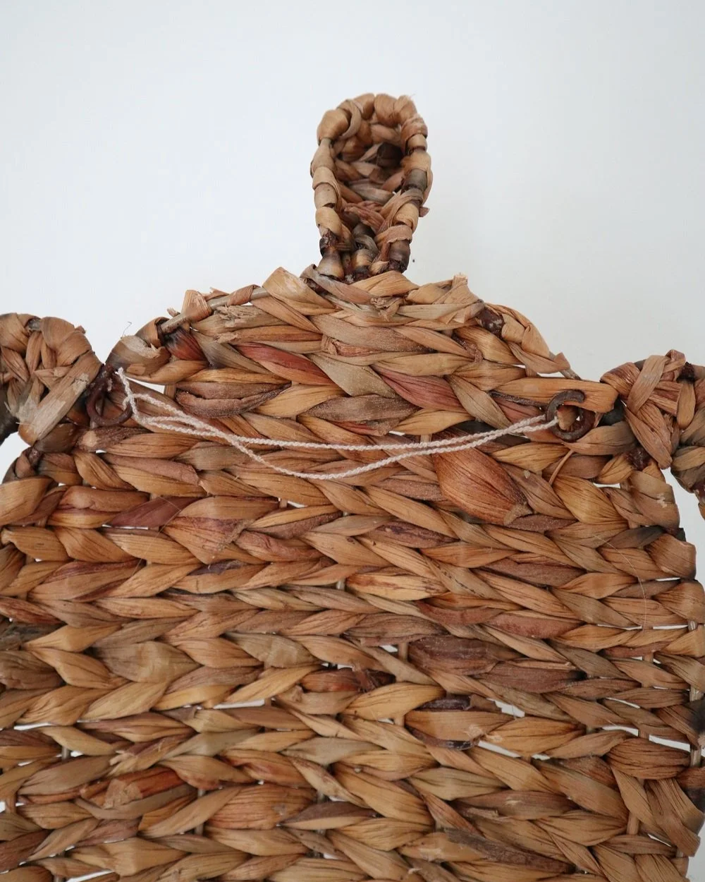 Set of two vintage turtle wall hangings handmade with woven natural water hyacinth.