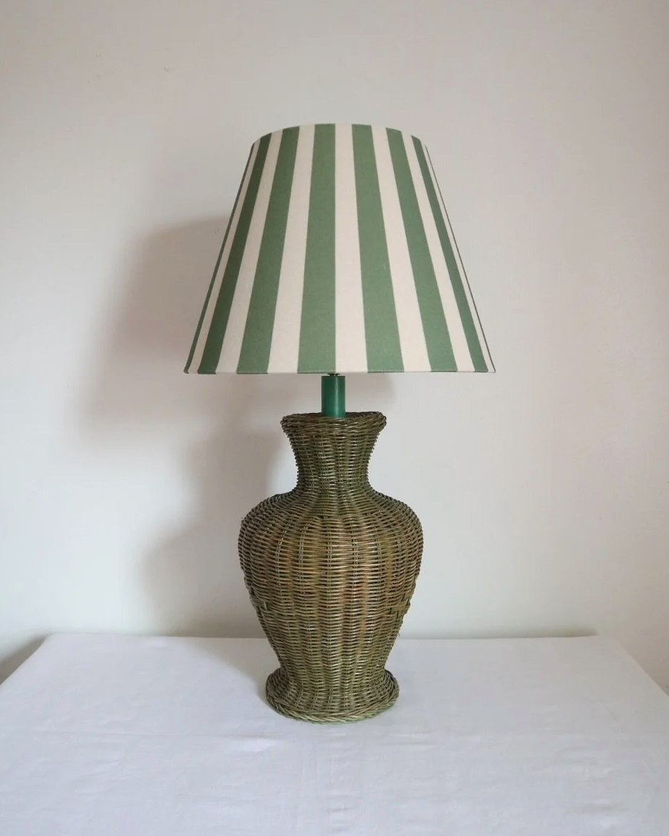Vintage, large painted green woven wicker table lamp with new, vertical striped cotton lampshade.