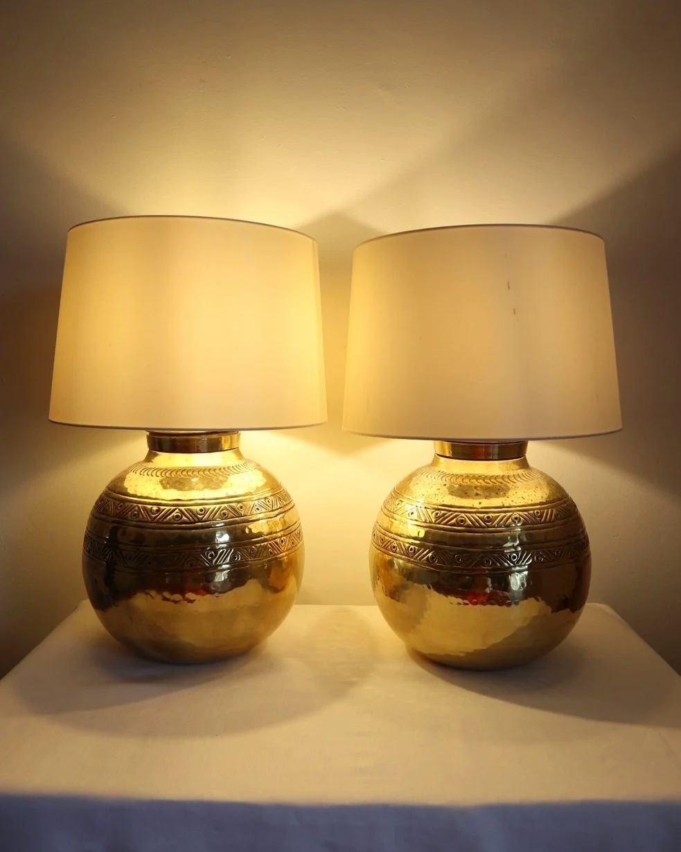 Pair of large, vintage beaten brass spherical table lamps with etched decoration.