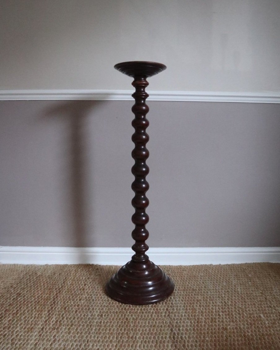 Tall mid century darkwood jardiniere plant stand display plinth with carved bobbin column and heavy turned wood base.