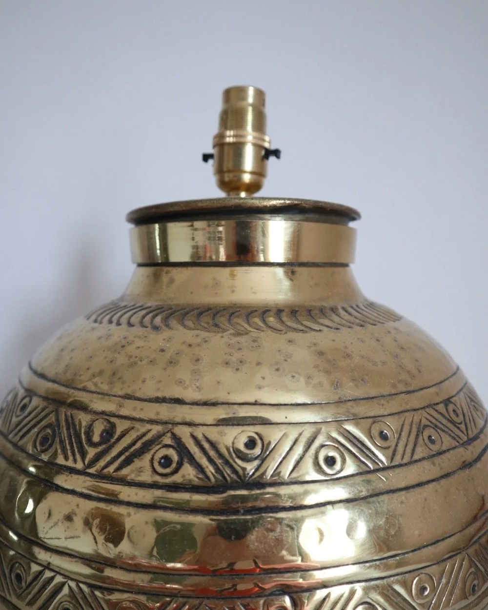 Pair of large, vintage beaten brass spherical table lamps with etched decoration.