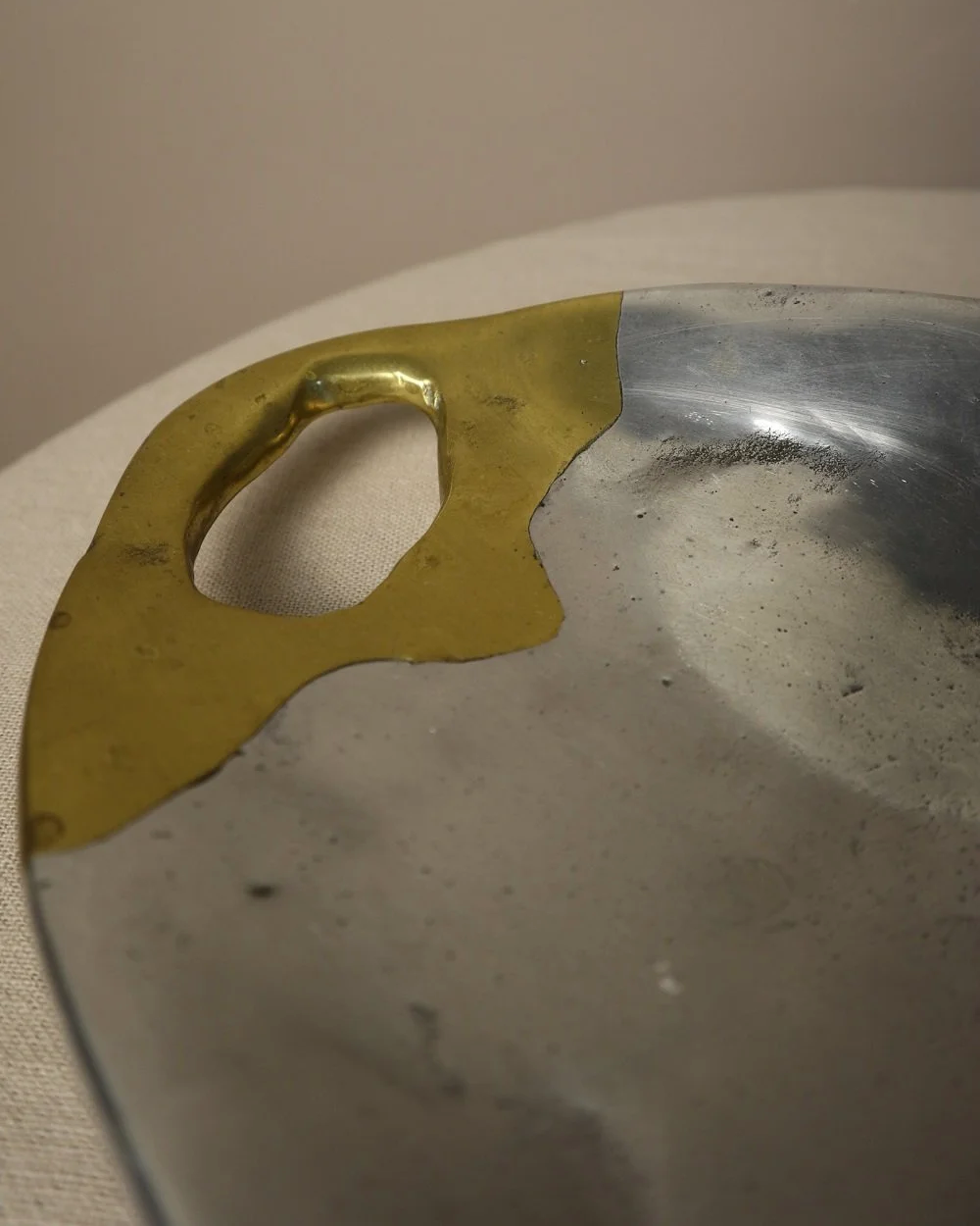 Brutalist heavy cast aluminium and brass decorative shallow bowl /dish by David Marshall, circa 1970s.