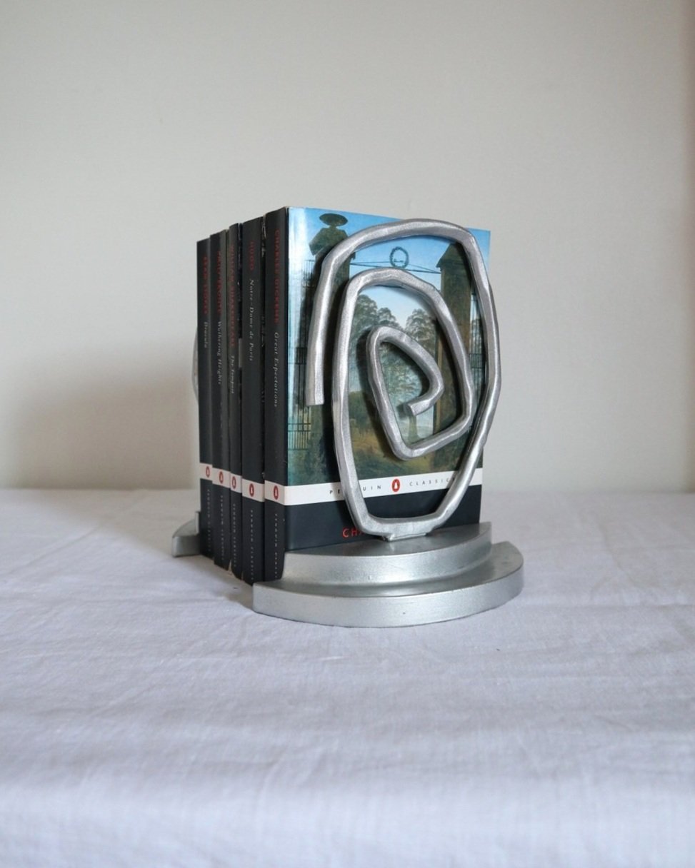 Pair of Postmodern sprayed silver spiral bookends, circa 1990s.