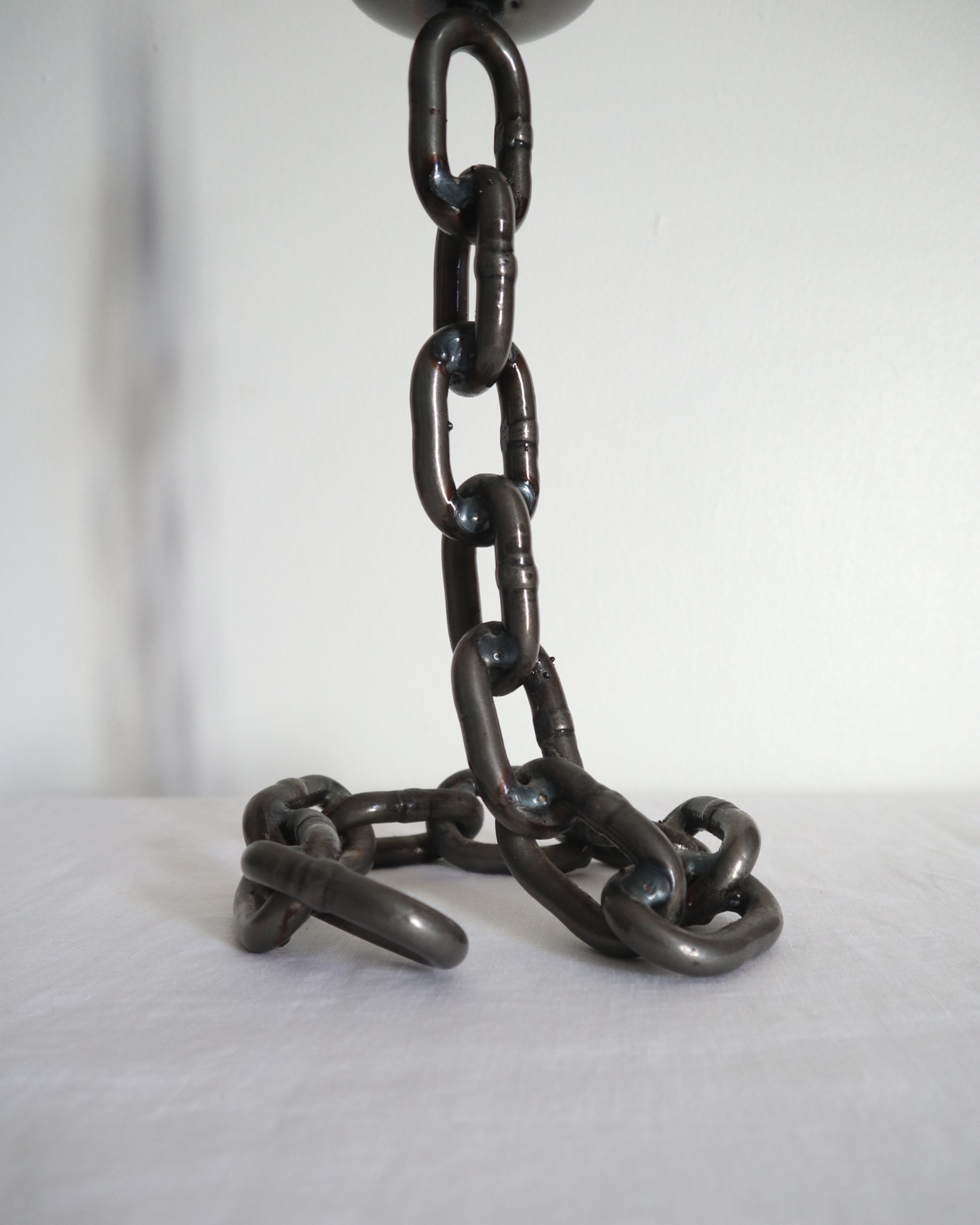 Heavy, vintage Brutalist chain link candlestick made from lacquered grey forged iron.