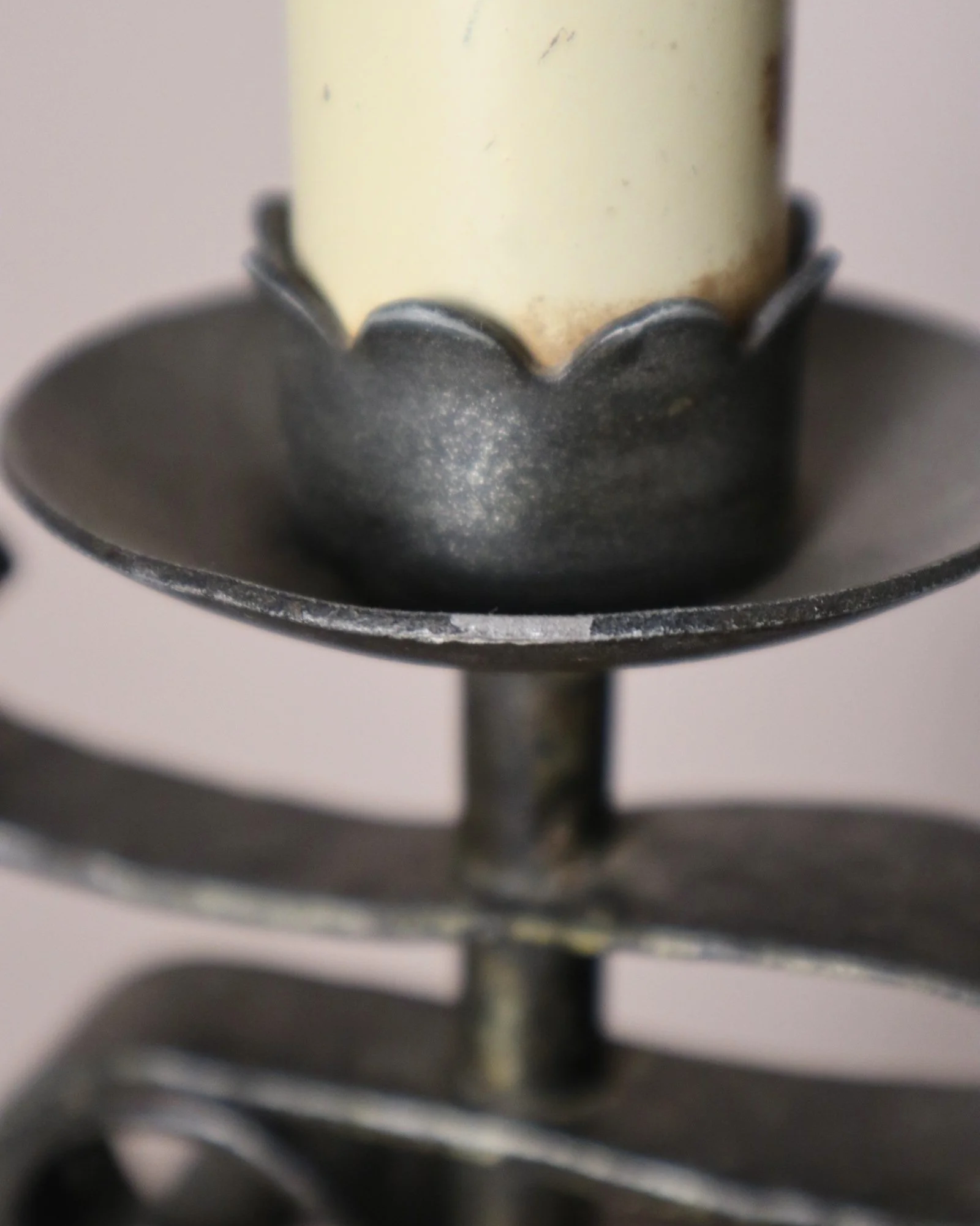 Vintage Art Deco style metal candlestick table lamp with elegant scroll detailing.