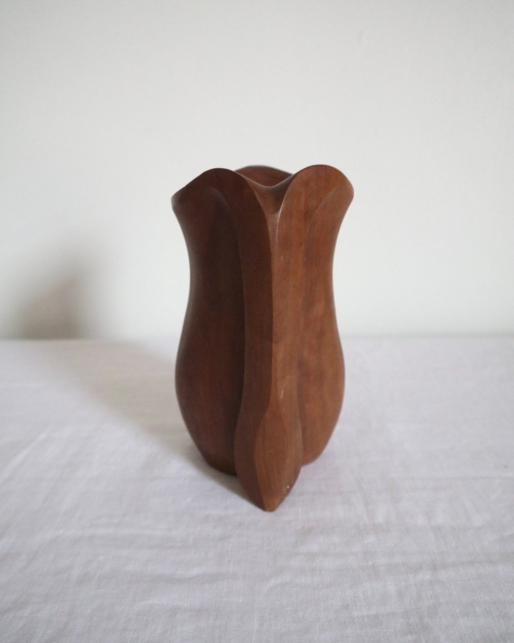 Small sculptural hand carved dark olivewood monoxyl pitcher, circa 1960/70s. In the manner of Alexandre Noll. Unsigned.