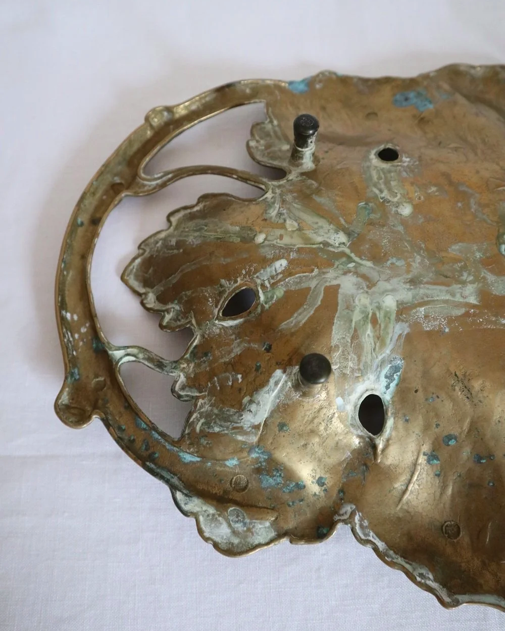 Vintage solid brass decorative Art Nouveau dish of intertwined grapevine leaves, circa 1960s.
