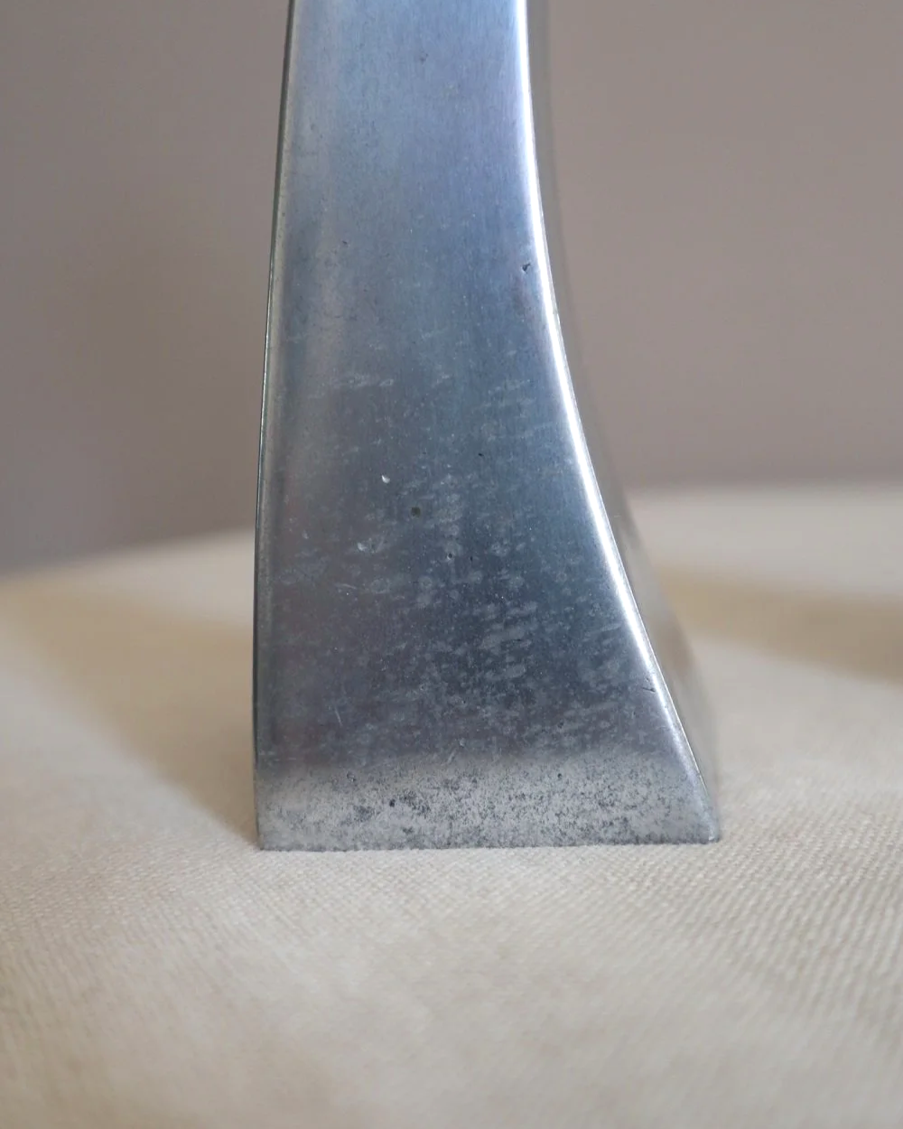 Pair of tall, elegant 1980s Modernist cast aluminium candleholders, likely 'Nessie' style designed by Matthew Hilton.