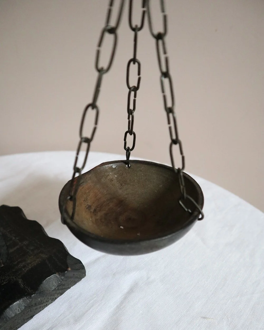 Vintage Spanish rustic carved wooden scales with circular hanging trays on chains.