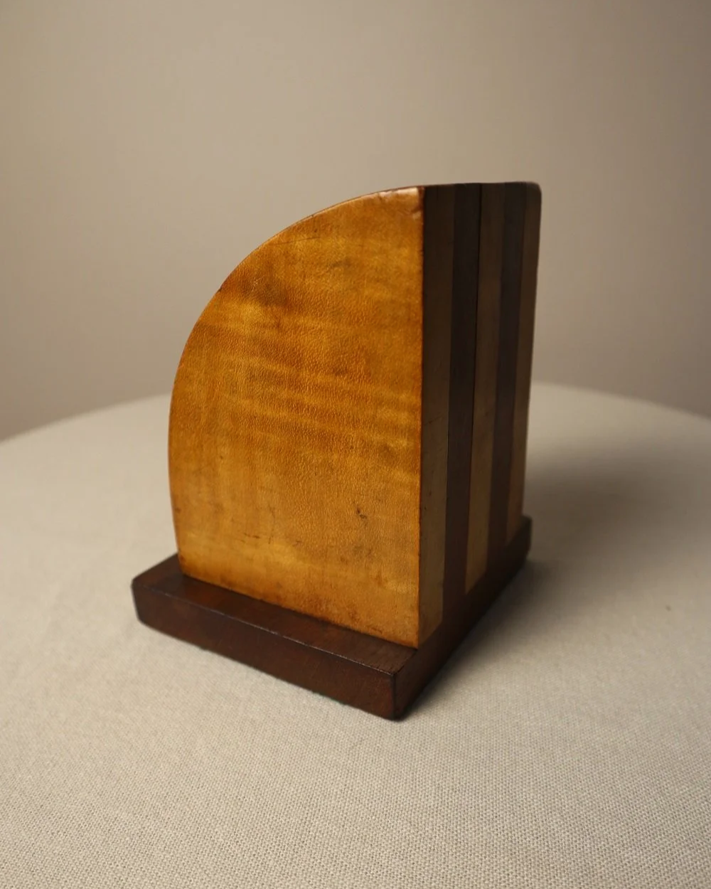 Vintage Art Deco style two tone arched wooden bookends.