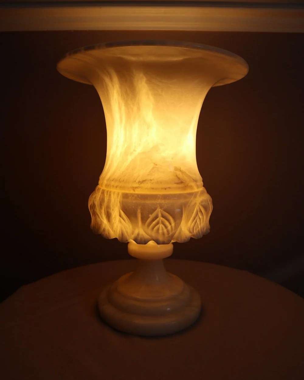 Large Italian carved alabaster urn table lamp, with delicate petal details.